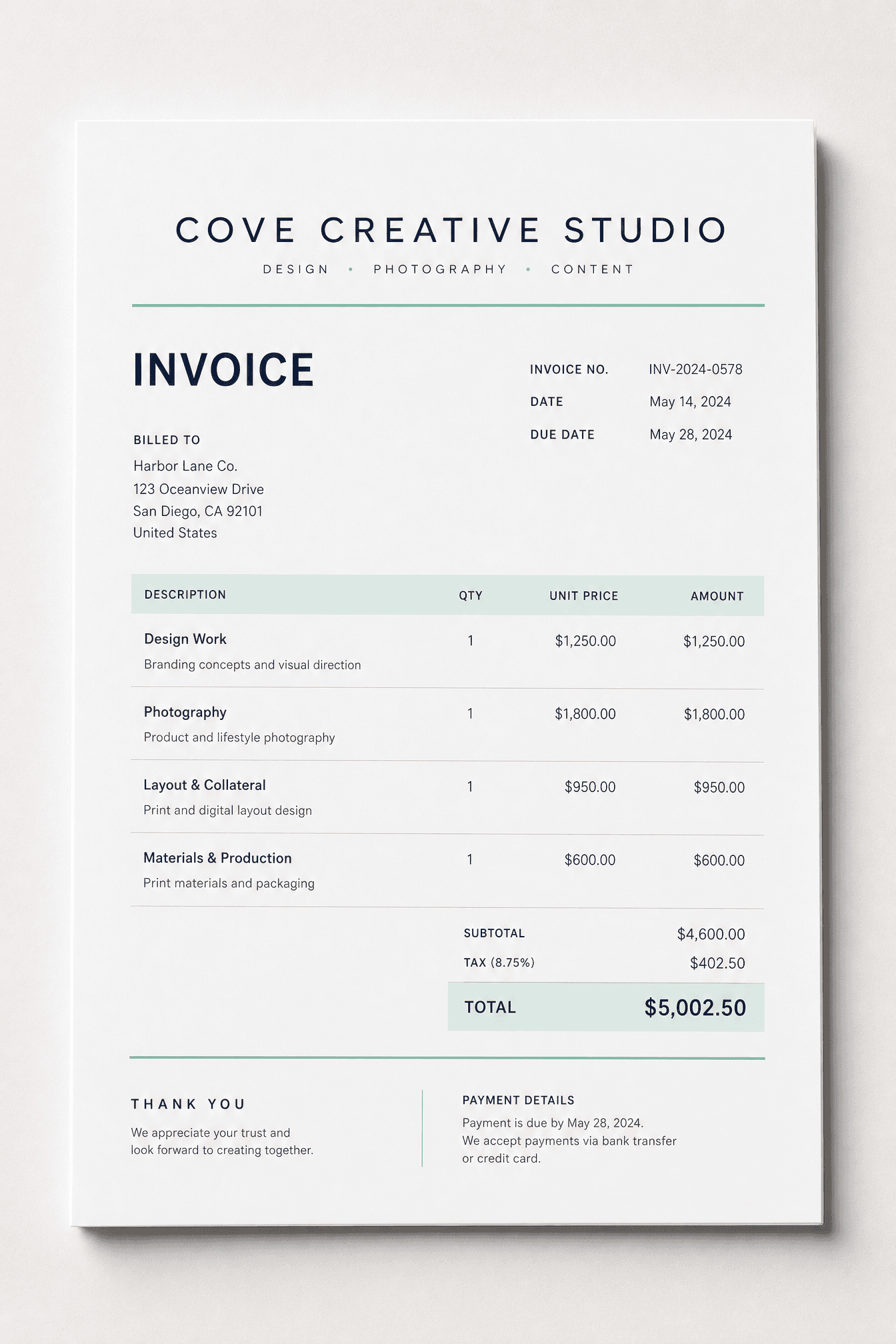 A clean branded invoice with aligned line items and a total